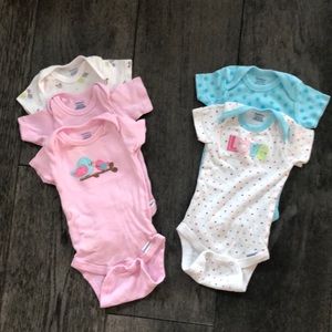 Bundle of five Gerber onesies
